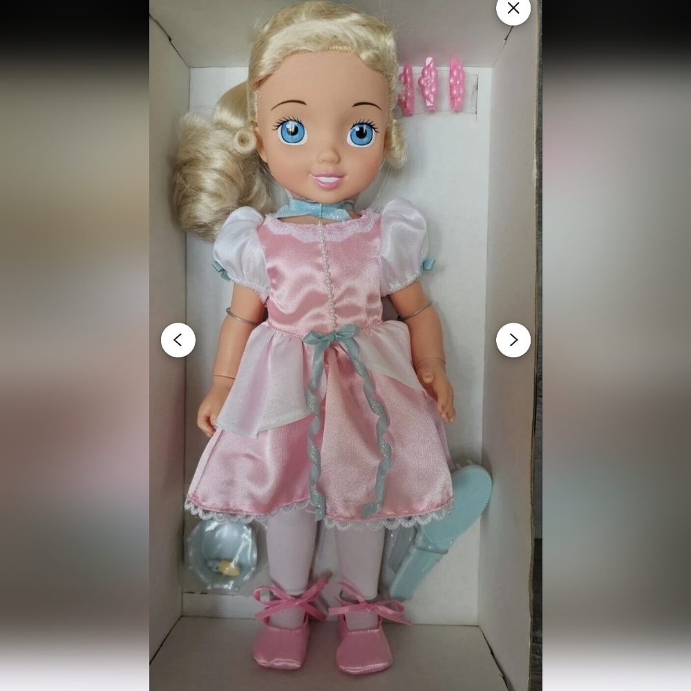 Adorable Pink and White Doll with Blonde Hair